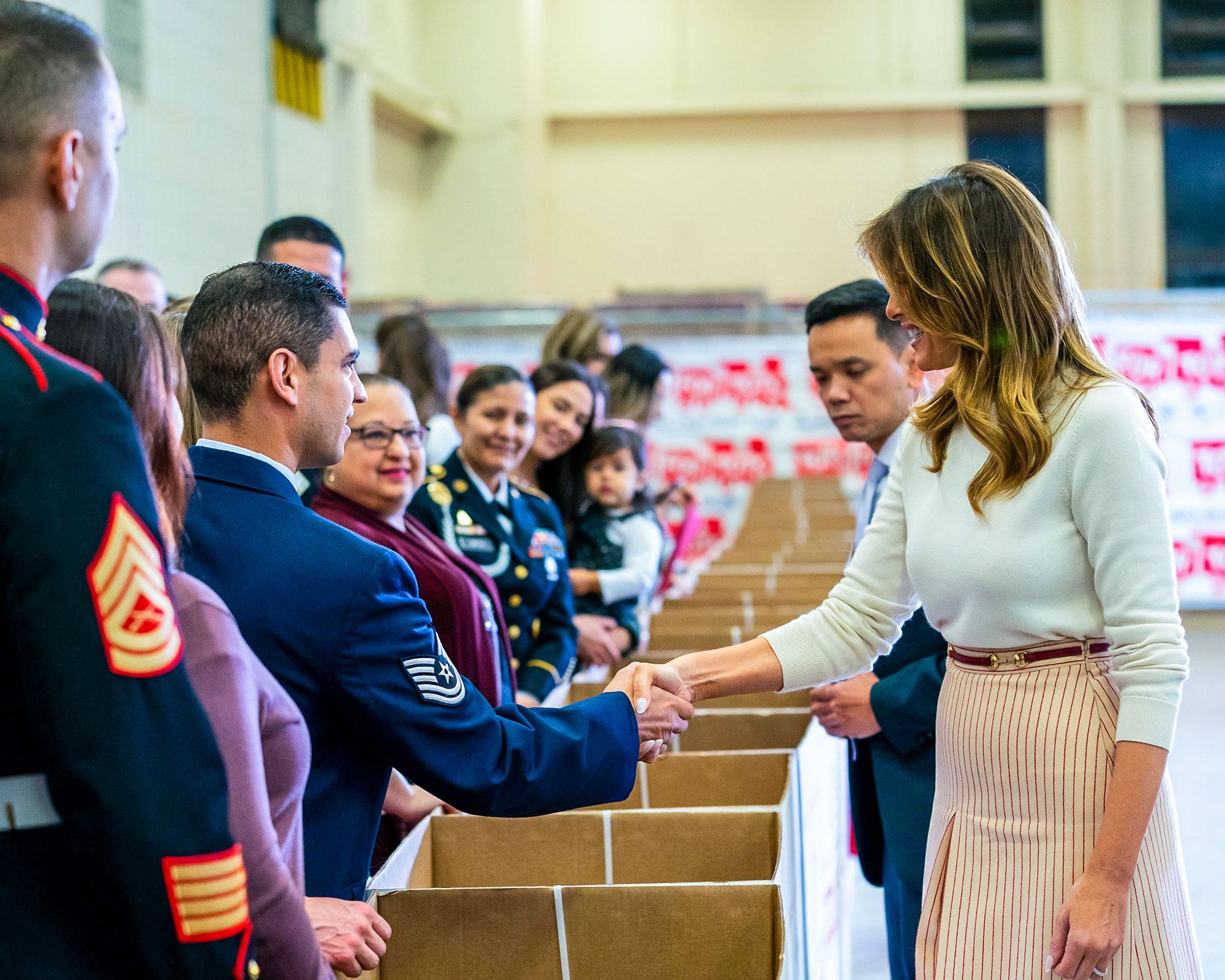 First Lady Melania Trump greets service members and their families attending a Toys for Tots Christmas Event Monday, Dec. 9, 2019, at Joint Base Anacostia-Bolling in Washington, D.C.