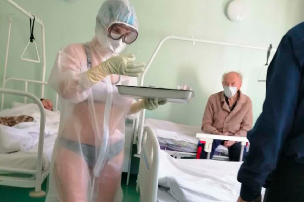 Only In Russia: ‘Hot’ Nurse Disciplined For Wearing Bra And Panties Under See-Through PPE Gown
